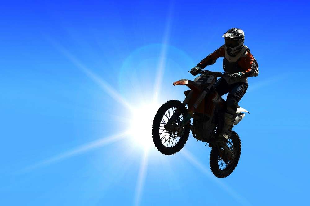 man riding the best motocross bike for tall riders